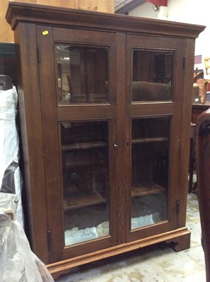 Lot 968 - Oak bookcase with shelved interior enclosed by two glazed doors