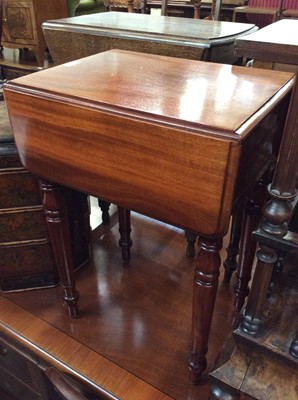 Lot 884 - Victorian mahogany work table with two flaps and two drawers on turned supports opening to 70 x 48 cm