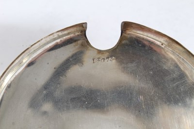 Lot 146 - George V silver hot water pot of tapered cylindrical form, domed hinged cover with turned wood finial and angular bakelite handle, (Birmingham 1918) together with a silver topped