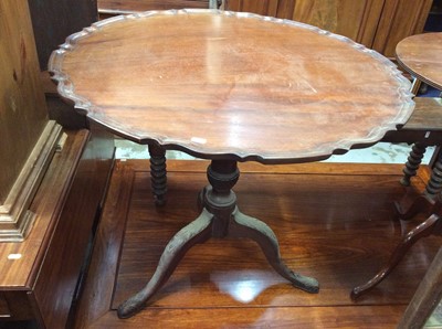 Lot 1004 - 19th century mahogany tilt top pie crust table on carved tripod base