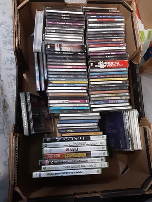 Lot 523 - Four boxes of CD's DVD's and games