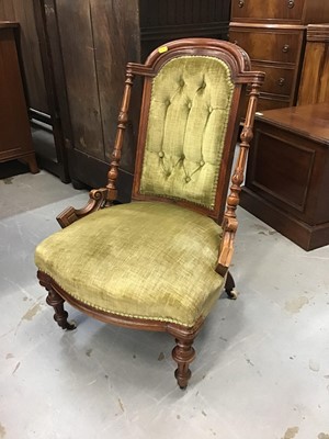 Lot 908 - Victorian walnut nursing chair with green velvet upholstery, together with a bergere stand (2)