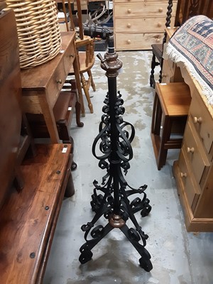 Lot 108 - Two early 20th century wrought iron oil lamp stands converted into standard lamps