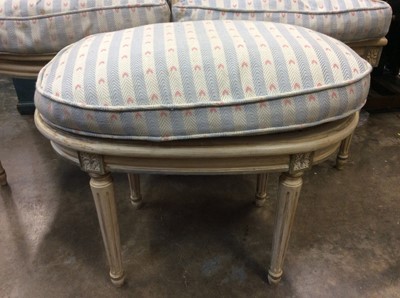 Lot 965 - Pair of painted open armchairs with caned backs and loose cushions in Bernard Thorp fabric, together with an oval stool