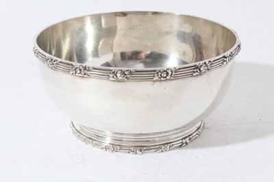 Lot 144 - American silver sugar bowl with reeded and foliate borders, on circular foot, stamped to underside Shreve & Co, San Francisco, 13cm diameter, 9.8ozs