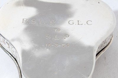 Lot 145 - George V silver trinket box of circular form, tortoiseshell lid inset with silver, raised on three feet, (Birmingham 1913) together with a late 19th century Dutch silver snuff box