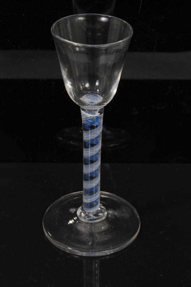 Lot 157 - Georgian blue and white double series opaque twist wine glass