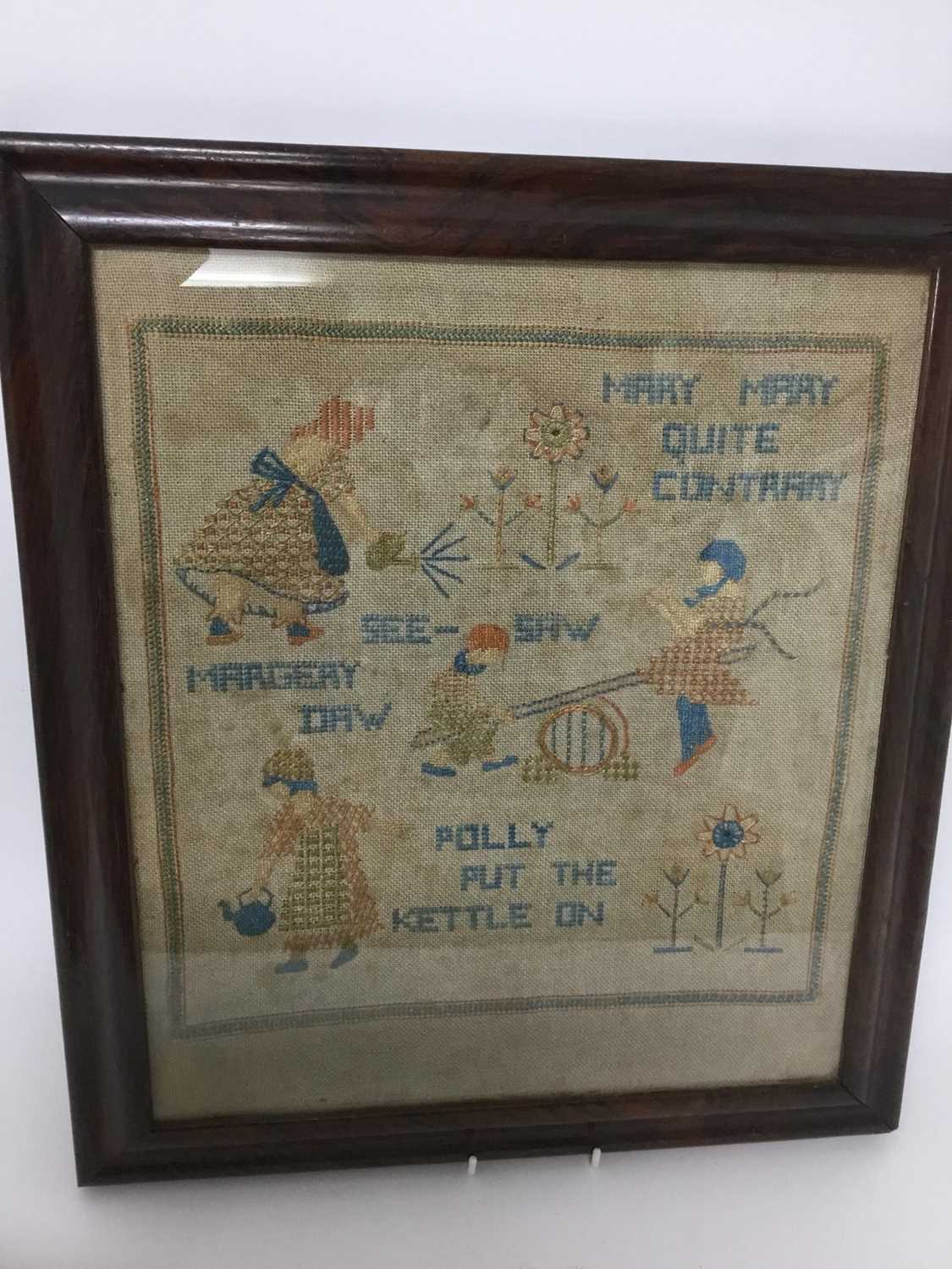 Lot 330 - Charming 1920s needlework sampler depicting