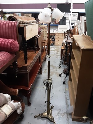 Lot 923 - Three brass standard lamps