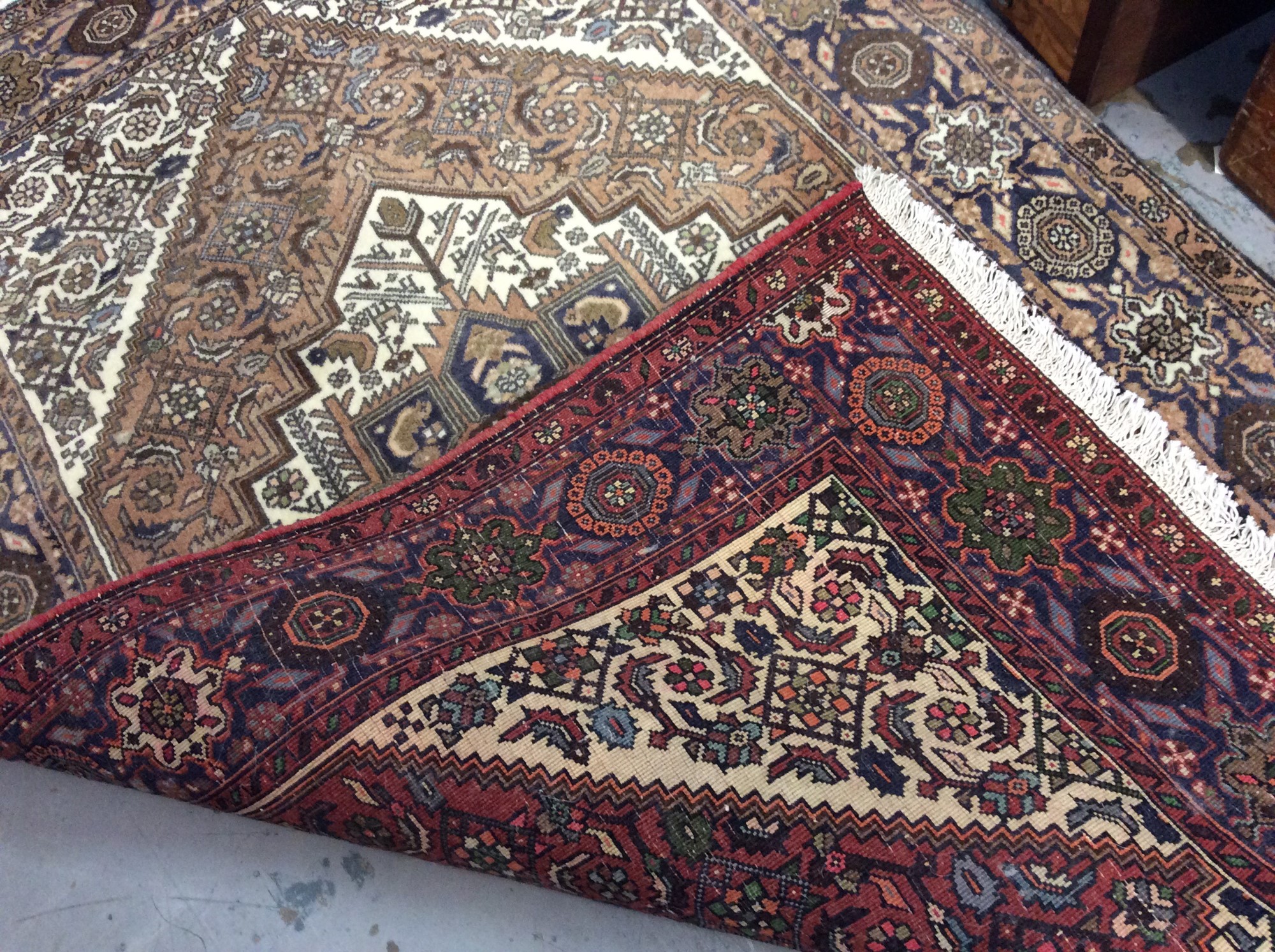 Lot 924 - Eastern rug with geometric decoration. 15cm