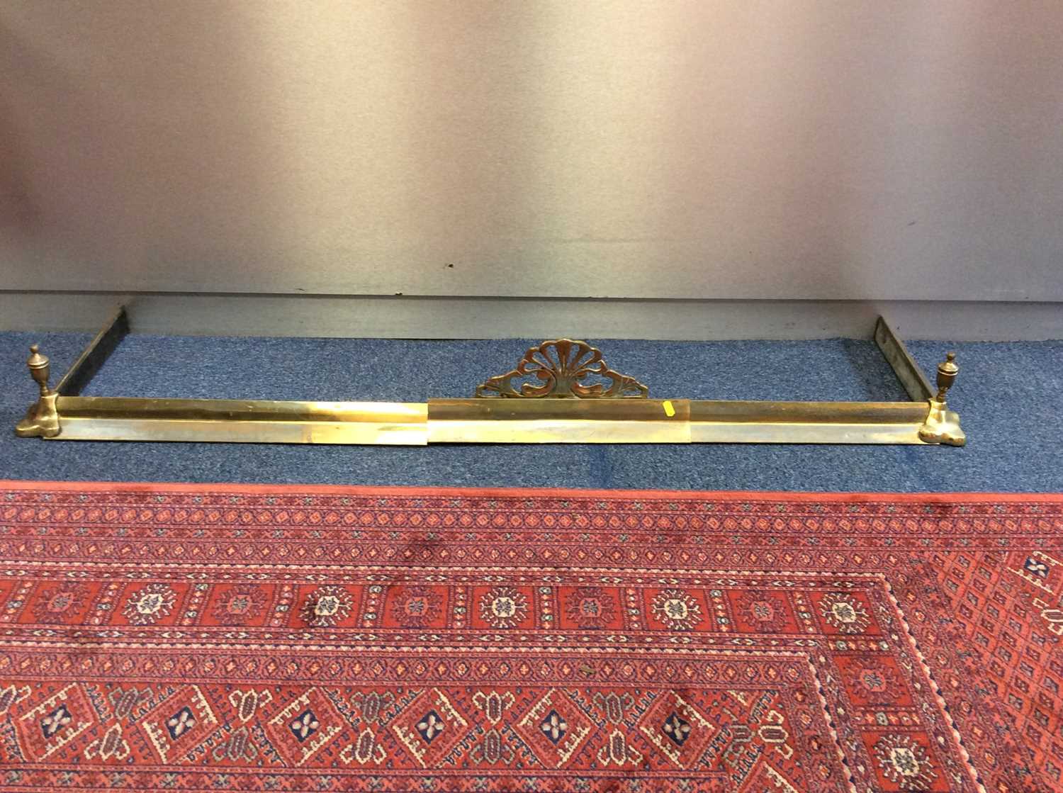 Lot 926 - Victorian brass fender. 154cm wide