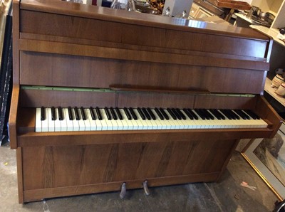 Lot 1037 - Good quality Kemble iron farmed upright over strung piano in walnut case, supplied by Harrods