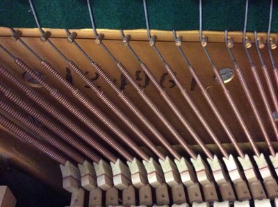 Lot 1037 - Good quality Kemble iron farmed upright over strung piano in walnut case, supplied by Harrods