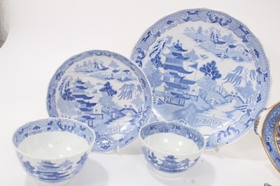 Lot 109 - A Miles Mason blue printed teapot stand, impressed mark, and other blue printed items