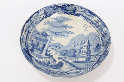 Lot 147 - A Miles Mason blue printed teapot stand, impressed mark, and other blue printed items