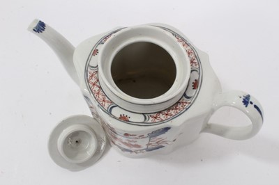 Lot 140 - A Keeling type serpentine sided teapot and cover, painted in Imari palette, pattern number 141, circa 1795, and a matching milk jug