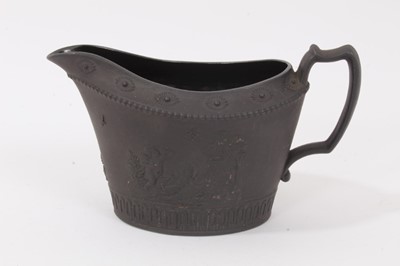 Lot 84 - A black basalt Low Bucket Shaped cream jug, probably Turner