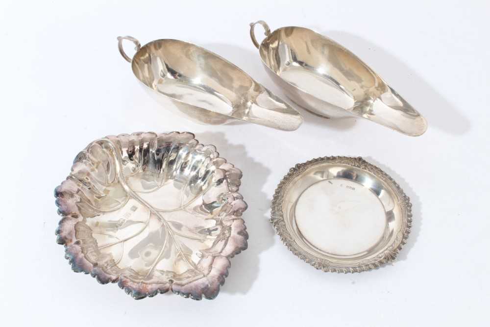 Lot 65 - Contemporary silver dish in the form of a Vine leaf (Birmingham 1987) together with a silver pin dish and two silver sauce boats (various dates and makers) all at approximately 8.5oz