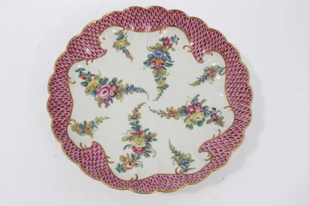 Lot 134 - Worcester pink scale bordered saucer dish, the porcelain circa 1770