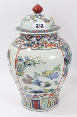 Lot 212 - Pair of Chinese Famille verte baluster vases and covers, each with six character Jiajing mark