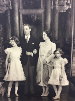 Lot 53 - T.M. King George VI and Queen Elizabeth and their two daughters -Princess Elizabeth and Princess Margaret with a Royal corgi at their feet- fine 1938 Marcus Adams black and white family portrait ph...