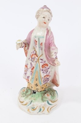 Lot 104 - Late 18th century Derby porcelain figure of a lady in a nightcap, holding a flower in her right hand, on a scrollwork base, 9cm height
