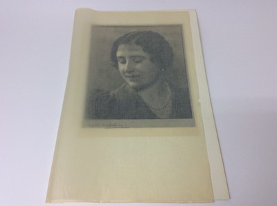 Lot 56 - H.M. Queen Elizabeth , fine late 1930s Dorothy Wilding black and white informal portrait photograph of The Queen wearing pearls , with tissue and card mount, signed by the photographer and label ve...