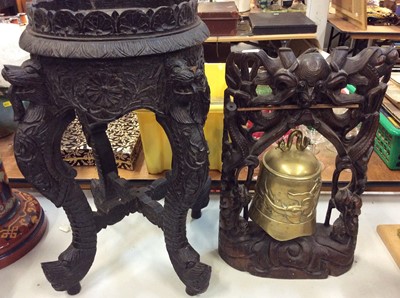 Lot 477 - Eastern carved hardwood gong with brass bell and carved hard wood jardiniere stand