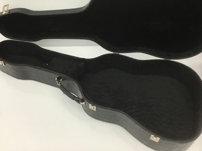 Lot 9 - Hard guitar case by Paxman, black finish, together with another Paxman guitar case with blue velvet lining, one other hard guitar case