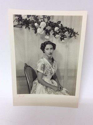 Lot 66 - H.R.H. The Princess Margaret , fine mid-1950s Cecil Beaton black and white portrait photograph of the attractive Princess in a floral dress , mounted on card and signed by the photographer 19.5 x 1...