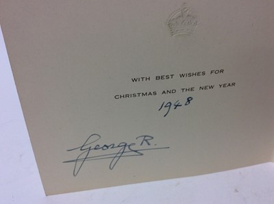 Lot 69 - H.M.King George VI - signed 1948 Christmas card with gilt embossed crown to cover, black and white photograph of the Royal family arriving by Ship on their tour of South Africa , signed in ink ' Ge...