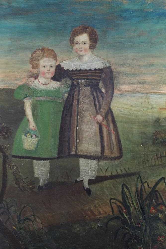 Lot 169 - 19th century American School, a naive oil on canvas of two children standing in a landscape, in gilt frame, 74 x 60cm