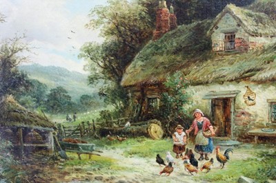 Lot 123 - William E. Ellis (1869-1923), oil on canvas, A country scene with peasants feeding chickens by a cottage door, signed, in a gilt frame, 27 x 38cm