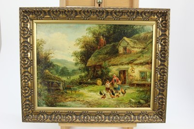 Lot 123 - William E. Ellis (1869-1923), oil on canvas, A country scene with peasants feeding chickens by a cottage door, signed, in a gilt frame, 27 x 38cm