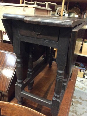 Lot 1025 - Old oak drop lead table with end draw on turned and block legs
