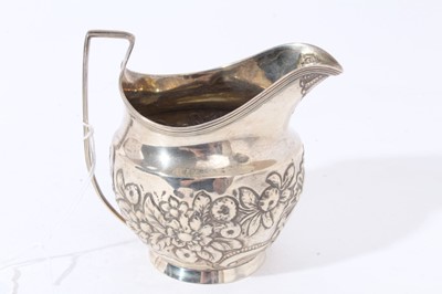 Lot 121 - George III silver milk / cream jug of bellied form with chased floral, foliate and scroll decoration (possibly later added), (London 1804), makers mark rubbed, all at 3.5oz, 10.3cm in height