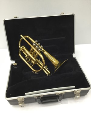 Lot 99 - King brass cornet, model 605, serial number 506883, together with a Benge 7 mouthpiece, cased, as new condition
