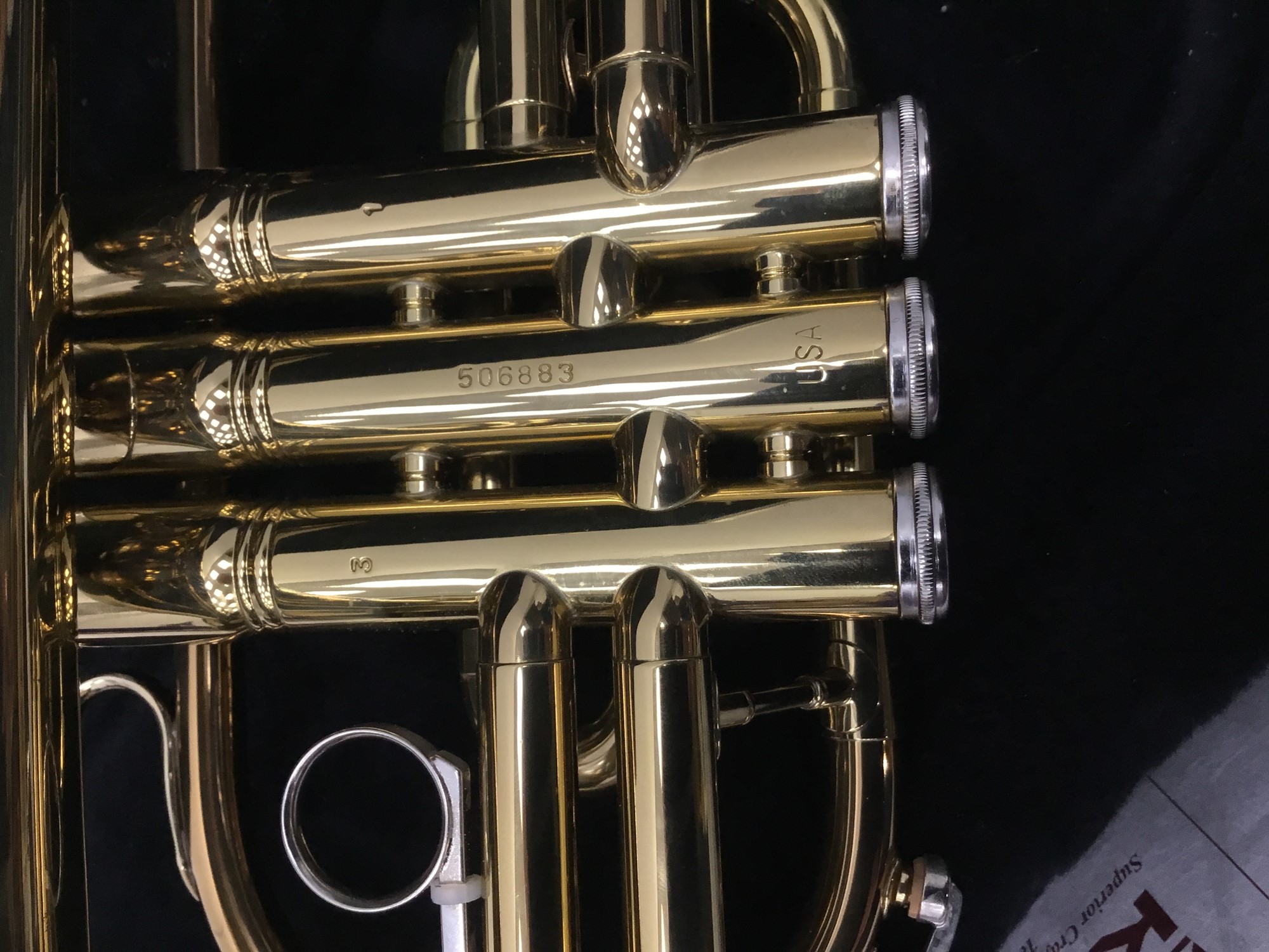 Lot 99 King brass model 605, serial number