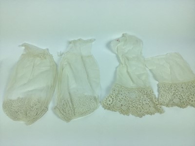 Lot 1759 - 19TH Century lace items including a pair of Honiton appliqué lace sleeves, a pair of  Irish crochet cuffs with part lawn sleeves, a pair of wide ruffled white-oirk cuffs and jabot, Limerick tambour...