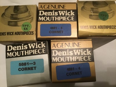Lot 58 - Three Dennis Wick cornet mouthpieces and two Denis Wick trumpet mouthpieces, all boxed and new
