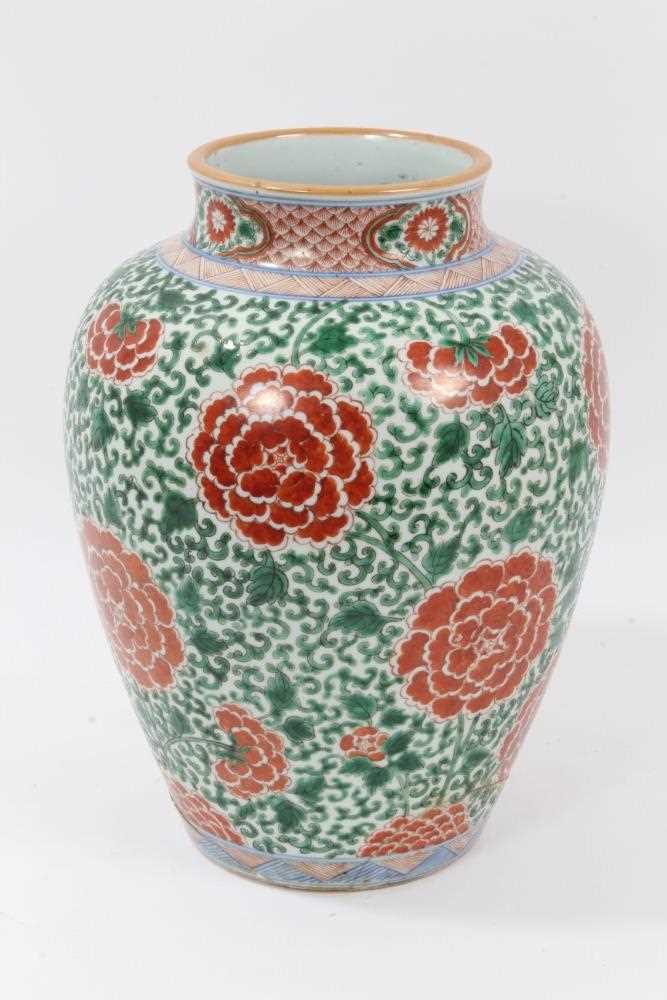 Lot 91 - 17th century Chinese Wucai porcelain baluster jar, decorated with peonies