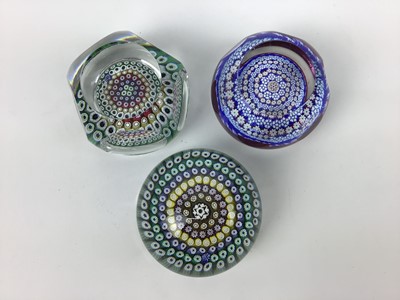 Lot 102 - Three Whitefriars art glass paperweights with date canes for 1975, 1979 and 1985 (3)