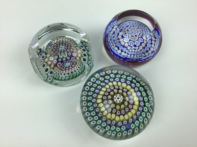 Lot 102 - Three Whitefriars art glass paperweights with date canes for 1975, 1979 and 1985 (3)