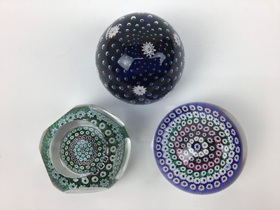 Lot 101 - Three Whitefriars art glass paperweights with date canes 1973, 1973 (3)