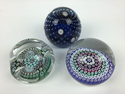 Lot 101 - Three Whitefriars art glass paperweights with date canes 1973, 1973 (3)