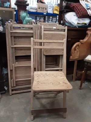 Lot 1056 - Twenty antique pitch pine folding chairs