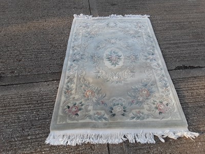 Lot 1071 - Chinese rug with floral decoration, 190cm x 121cm, plus another Chinese rug