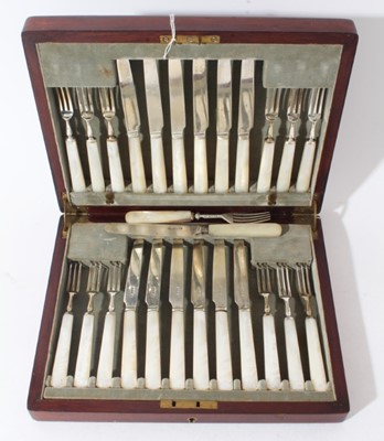 Lot 152 - George V silver dessert cutlery comprising twelve knives and twelve forks, (Sheffield 1929) maker, Cooper Brothers, together with one other set, in a fitted velvet lined mahogany box