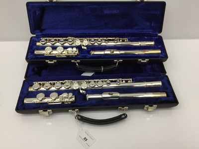 Lot 85 - Two Earlham silvered flutes, cased and as new
