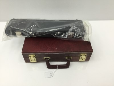 Lot 110 - Earlham silvered flute, cased, as new condition, together with Rudall Carte / Boosey and Hawkes clarinet, cased. (2)